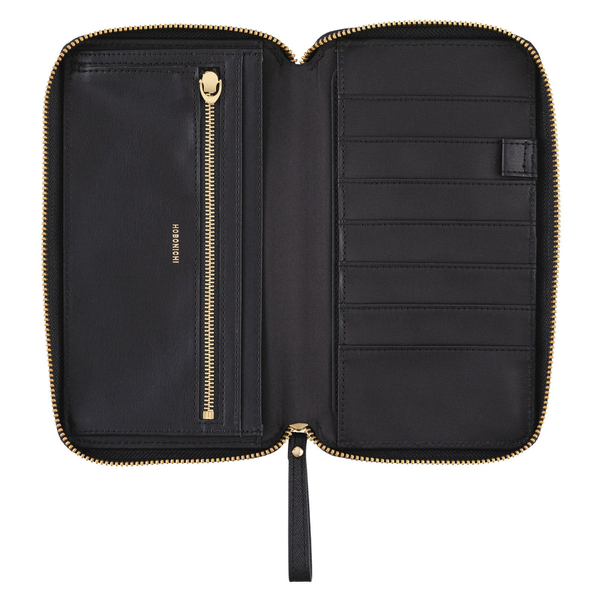 Black zippered fabric case open for Hobonichi Techo Weeks on white background