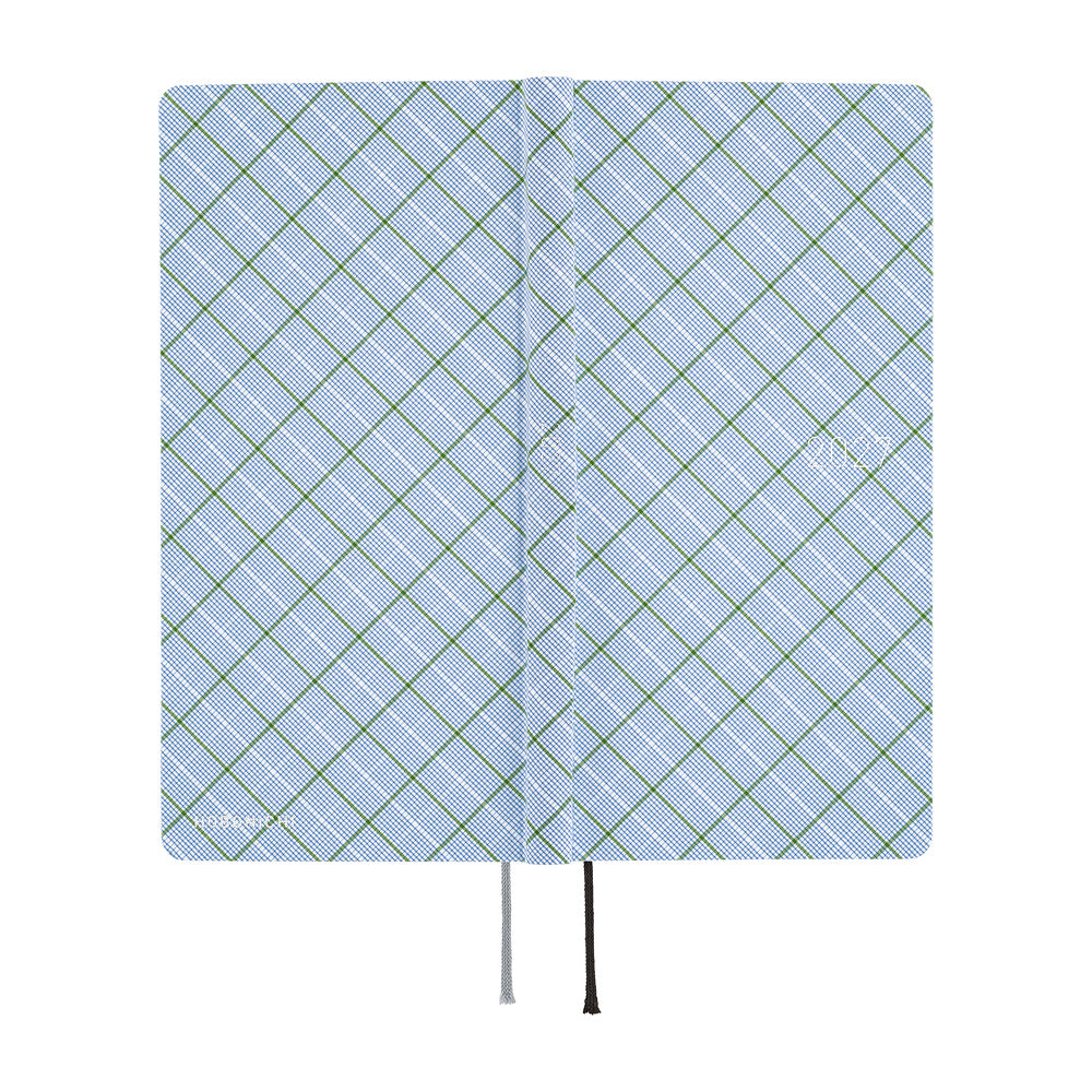 The exterior of a 2027 fabric-covered planner with a simple blue, white, and green plaid pattern across the cover.