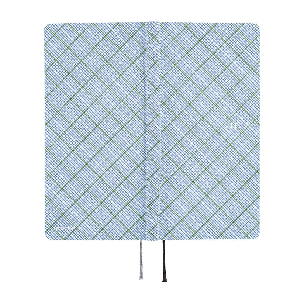 The exterior of a 2027 fabric-covered planner with a simple blue, white, and green plaid pattern across the cover.