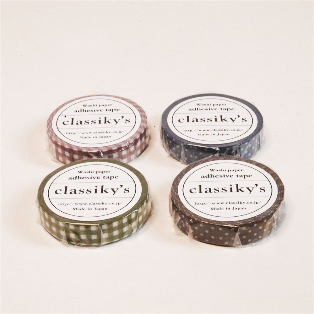 Four rolls of 'classiky's' adhesive washi tape on a white background