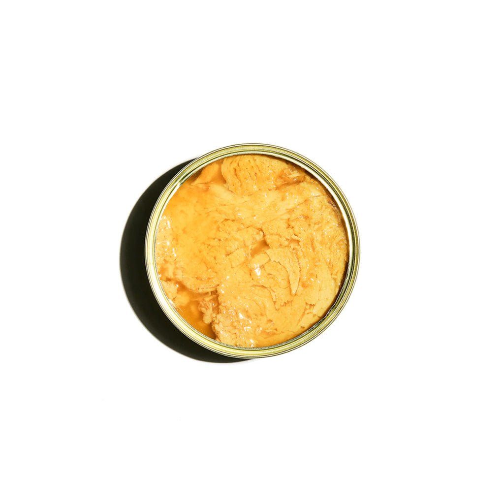 Open tin of Fishwife Albacore Tuna with Soy Ginger on white background