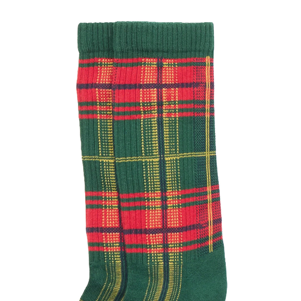 Close-up of red and green tartan plaid crew socks.