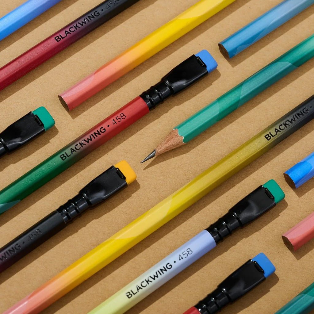 Close up of Blackwing 458 pencils with gradient designs on light background