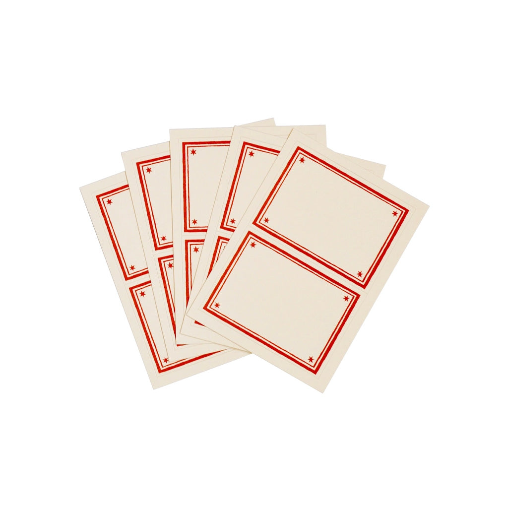 Set of sticky label sheets with red borders.