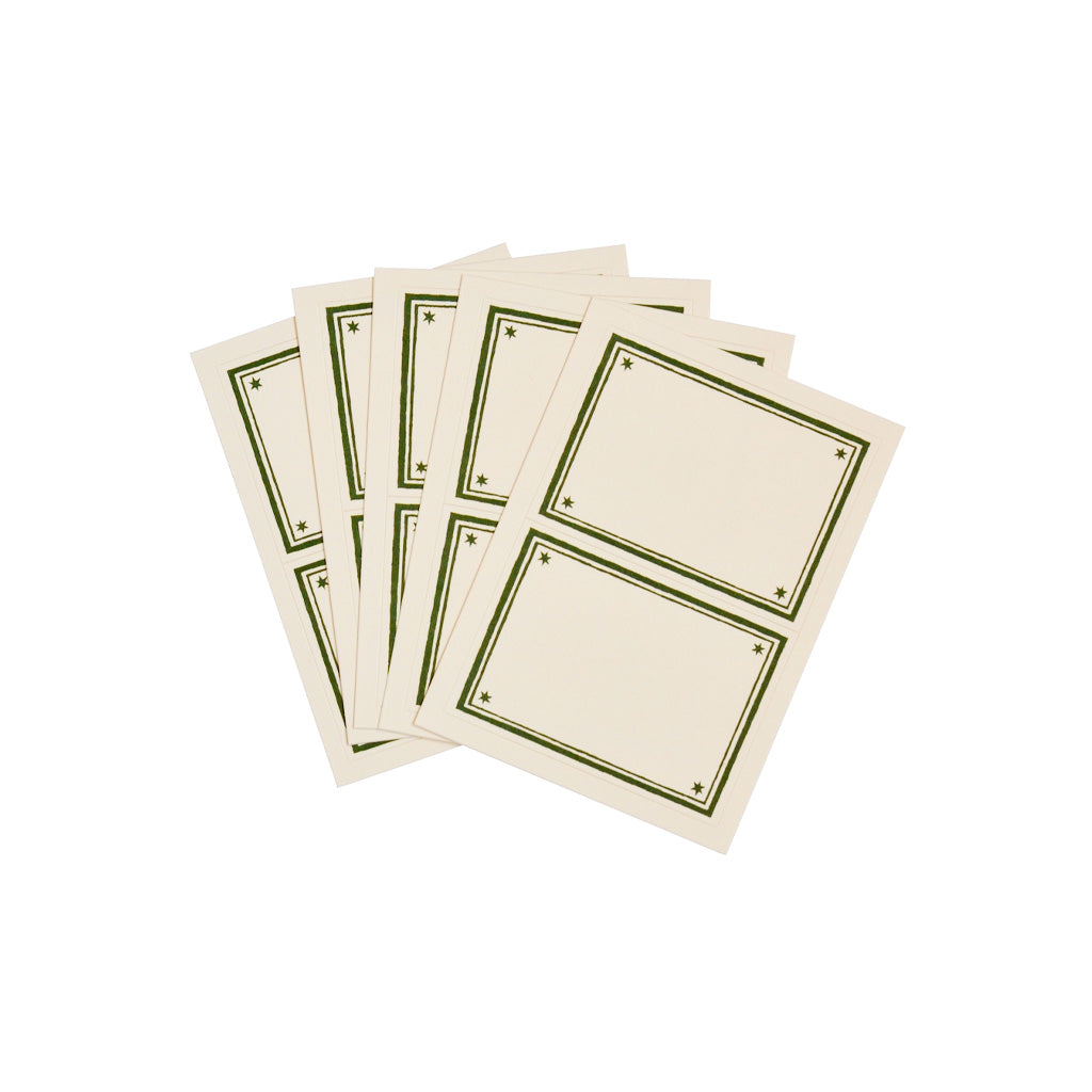 Set of sticky label sheets with green borders.