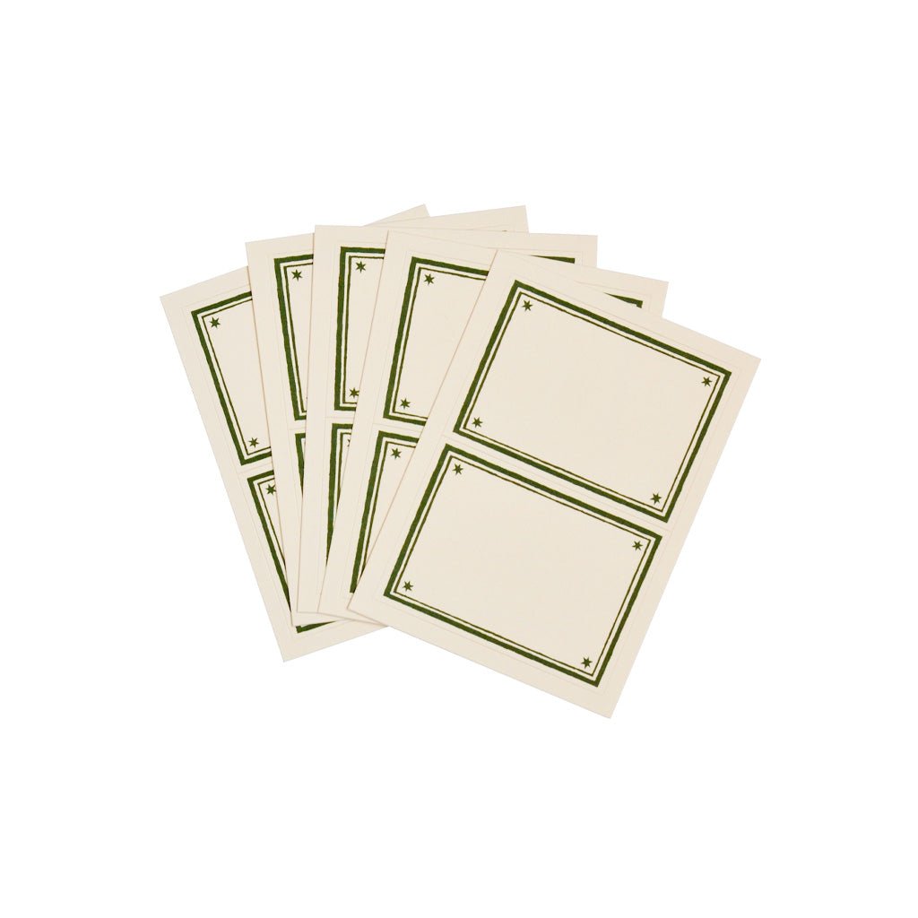 Set of sticky label sheets with green borders.