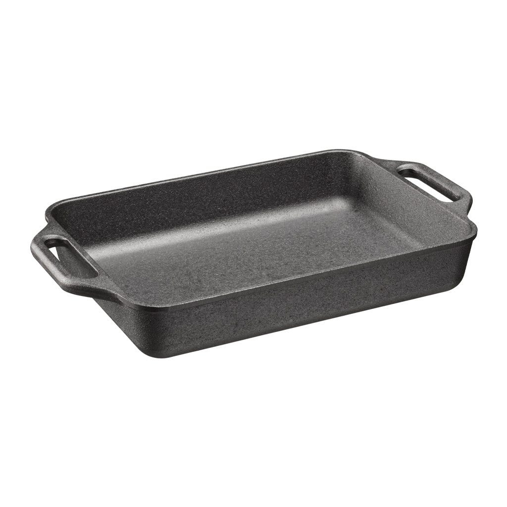 Black rectangular cast iron baking dish with handles on a white background