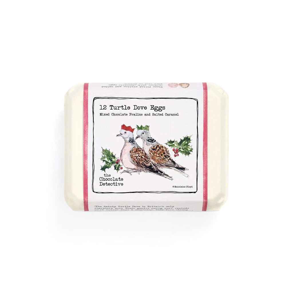 Front of carton of chocolate turtle dove eggs with illustrated label.