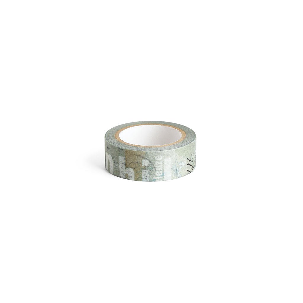 A roll of washi tape with a muted green and gray typographic pattern.