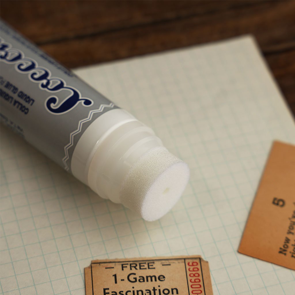 Close up of Coccoina 81 liquid glue sponge applicator