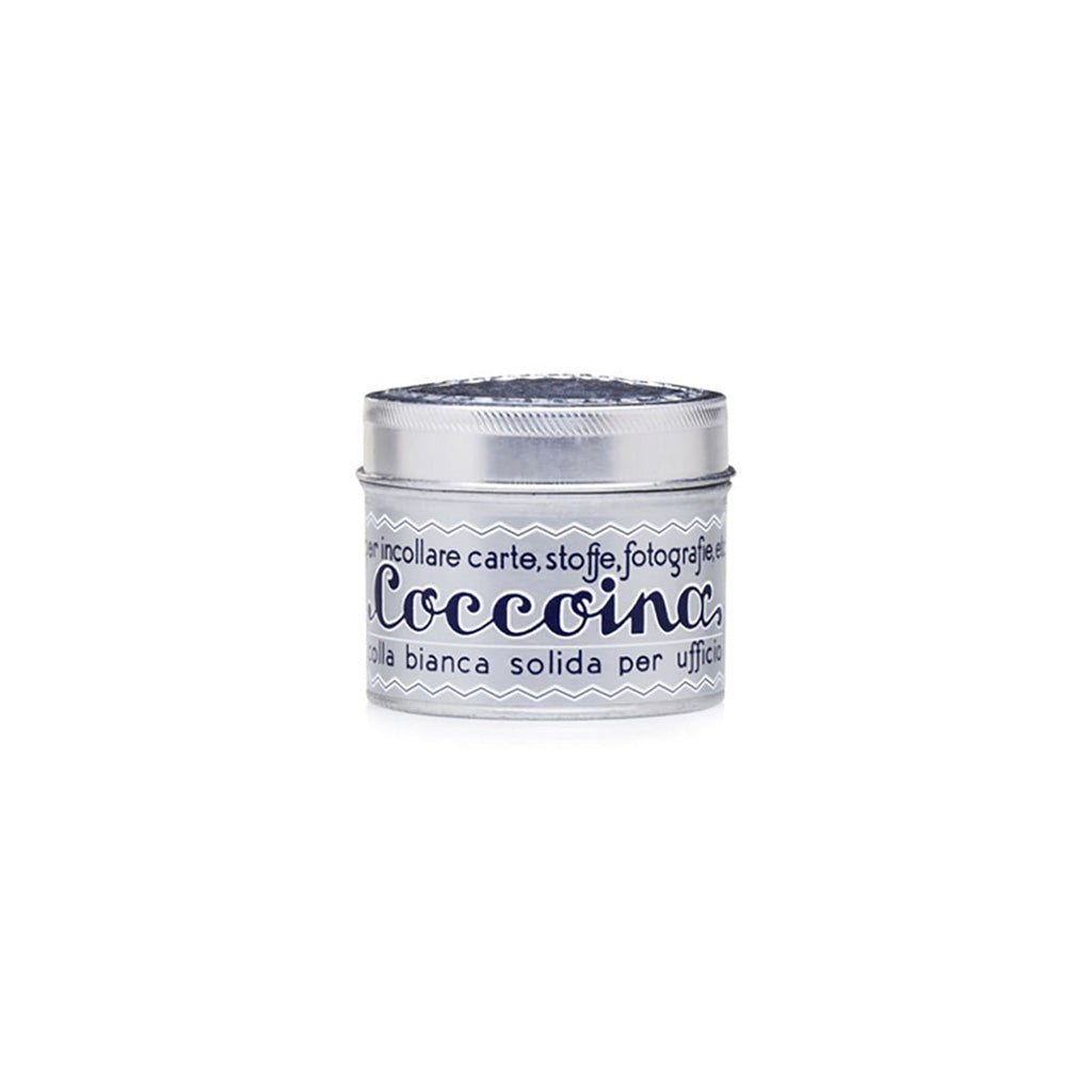 Tin of Coccoina adhesive paste on white background