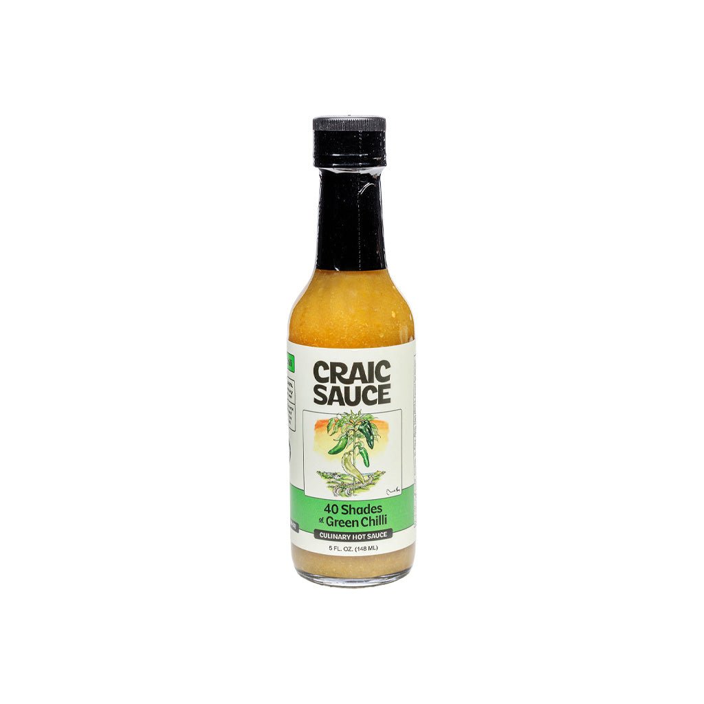 A bottle of Craic Sauce 40 Shades of Green Chili hot sauce on a plain white background.