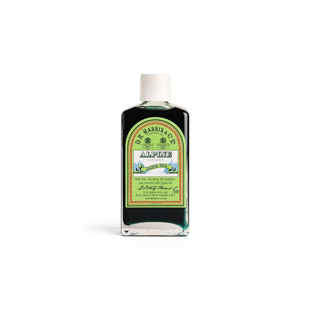 Bottle of D.R. Harris & Co. Alpine bath oil on a white background