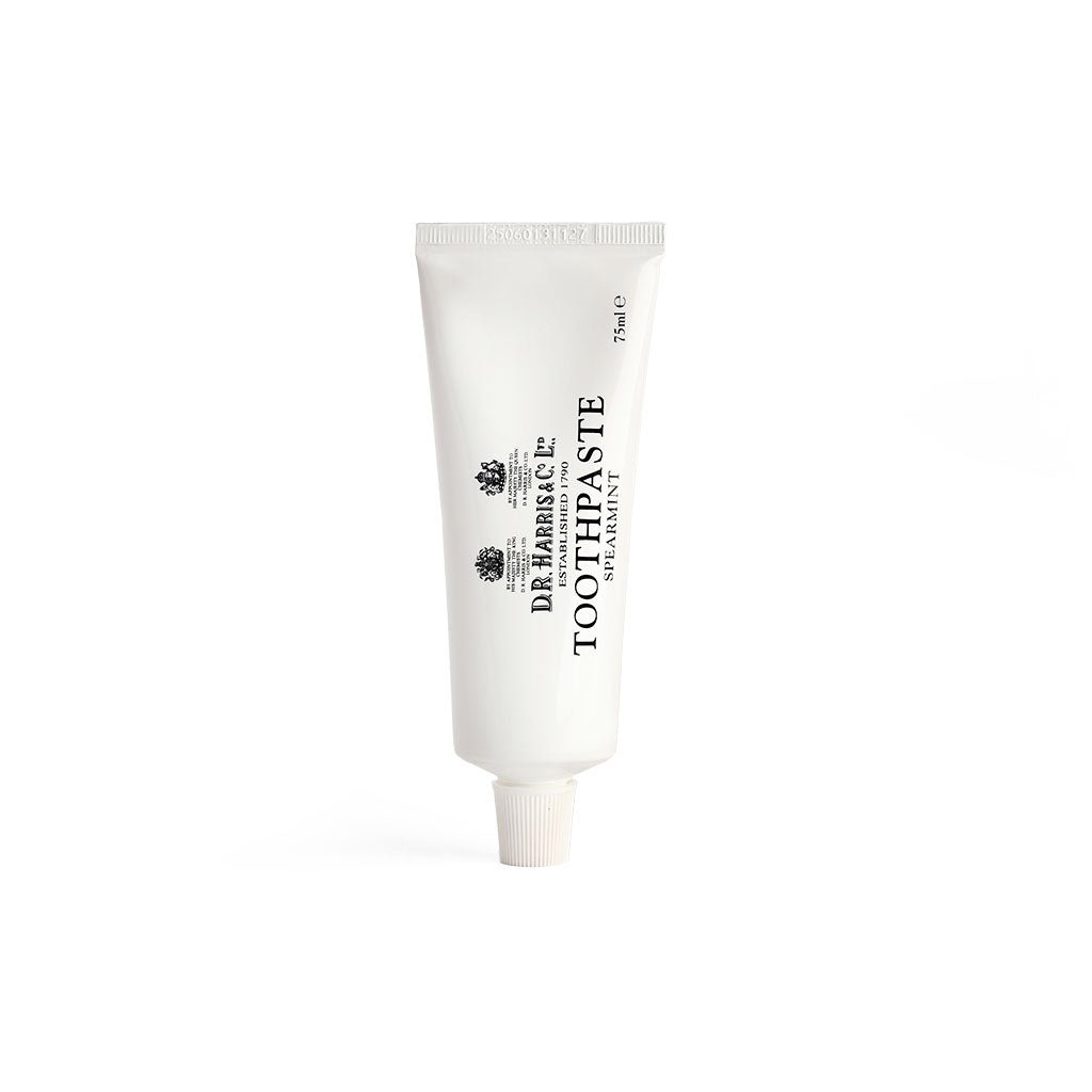 D.r. Harris spearmint toothpaste tube on a white background