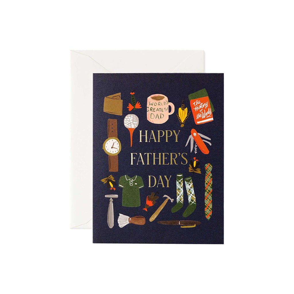 A navy-colored greeting card with illustrations of a watch, tie, and other items, celebrating Father's Day. Includes a white envelope.