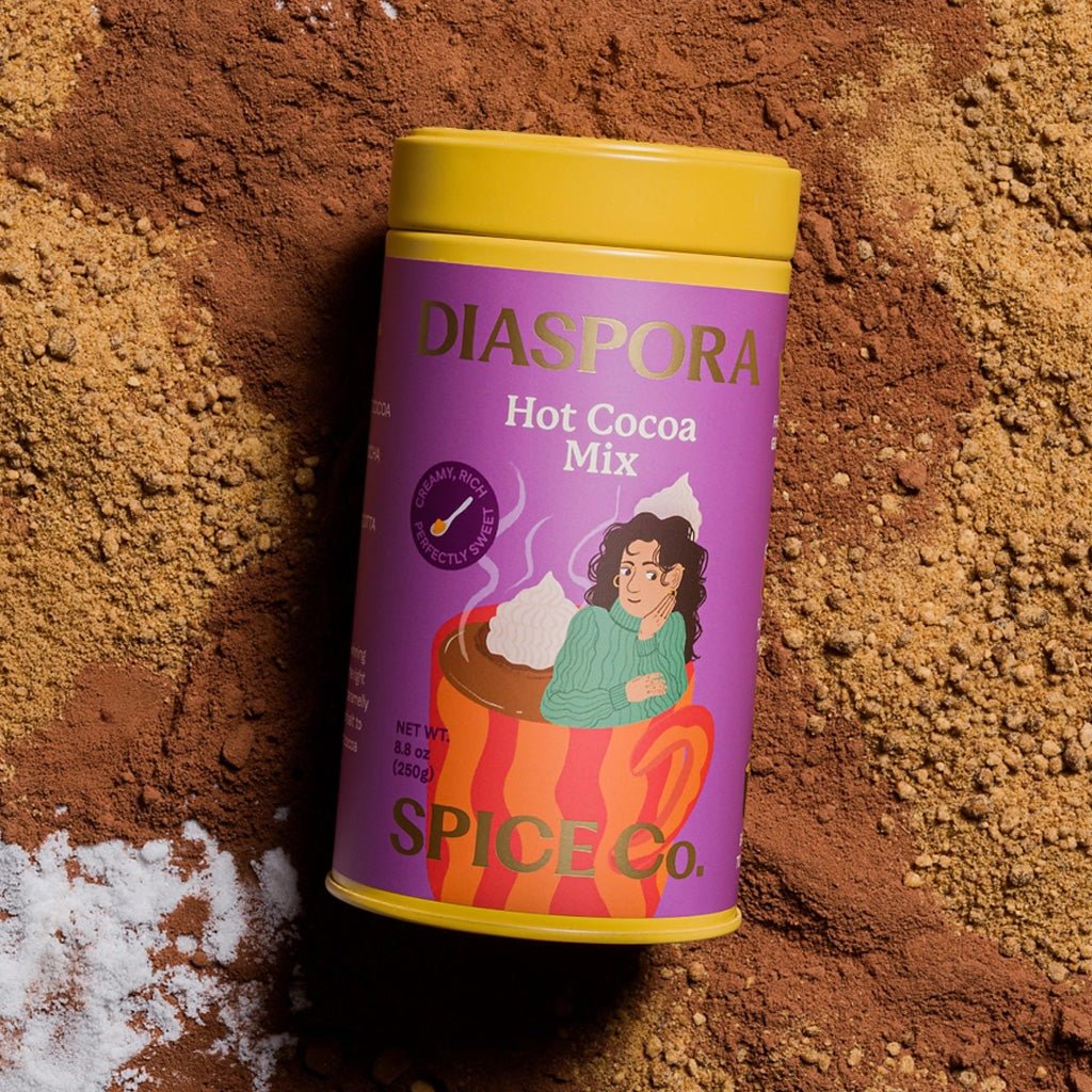 Tin of Hot Cocoa Mix on natural brown background.