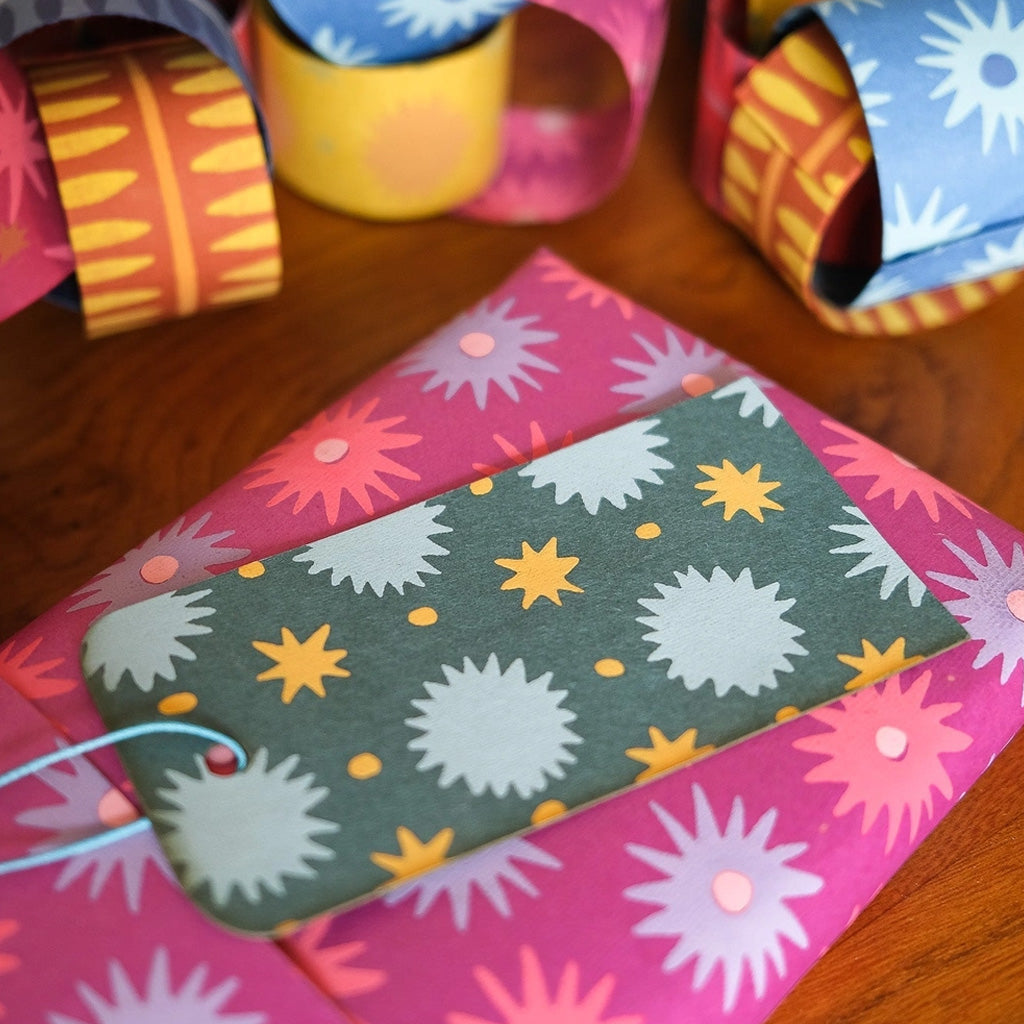 Gift tag on top of wrapped present.