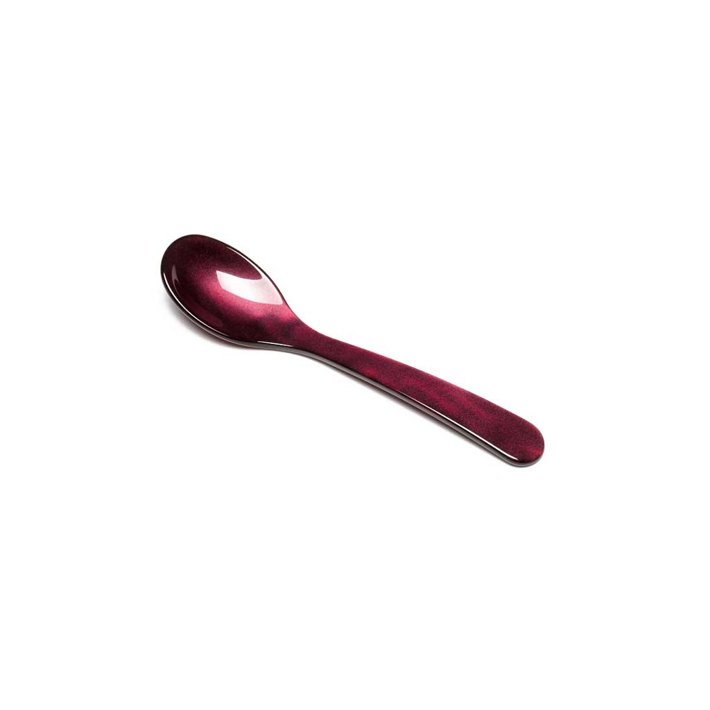 Wine purple acrylic egg spoon on white background