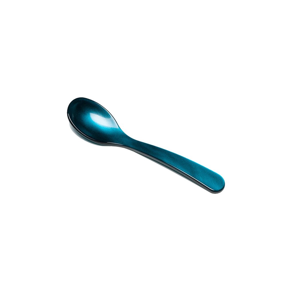 Dark blue acrylic egg spoon on white background