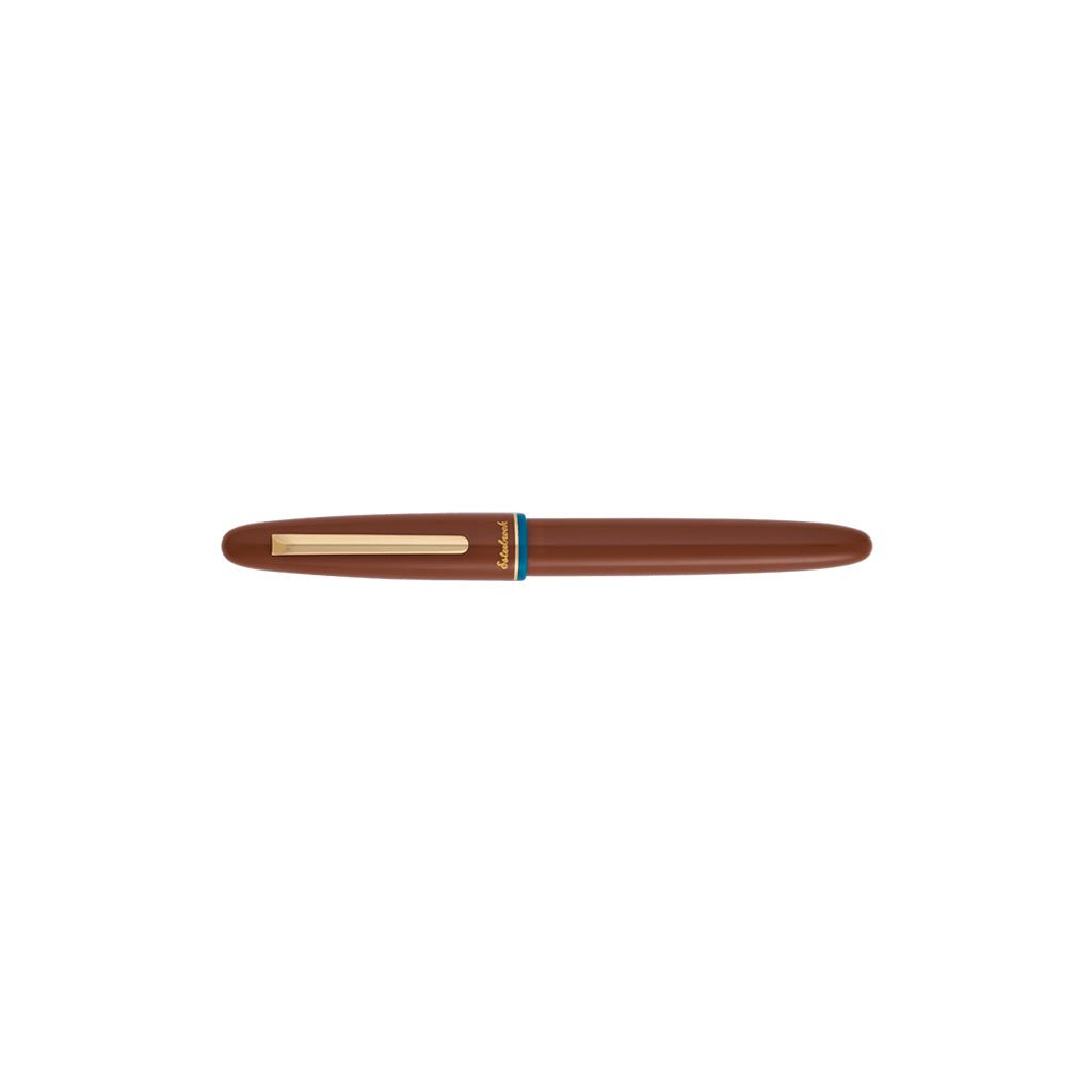 Brown pen with gold accents on a white background