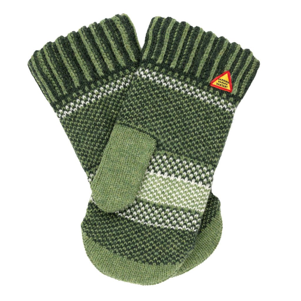 Green knitted mittens with a warning triangle label on a white background