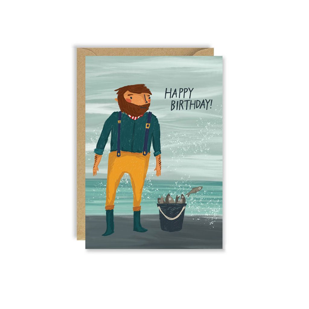 Illustration of a fisherman standing next to bucket of fish in front of the sea, with text that reads Happy Birthday