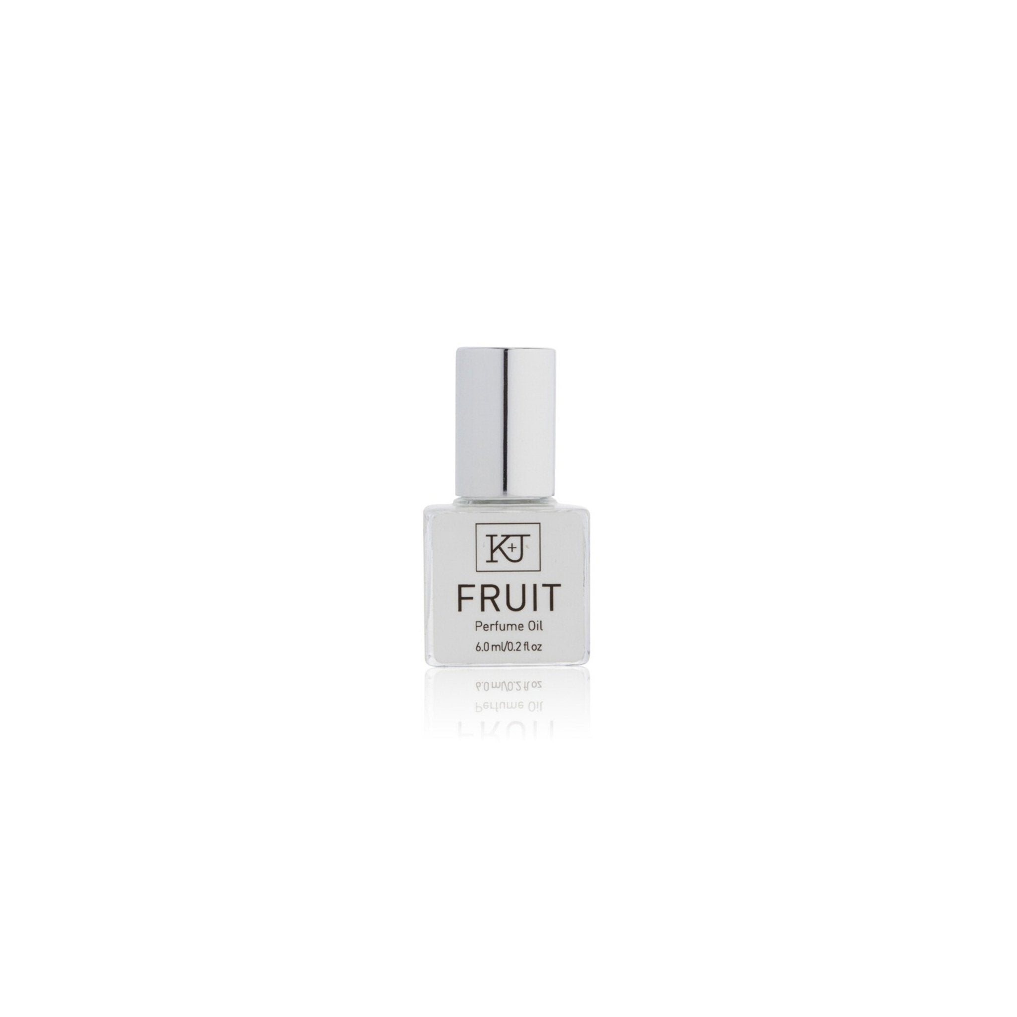 Perfume oil bottle labeled fruit on a white background