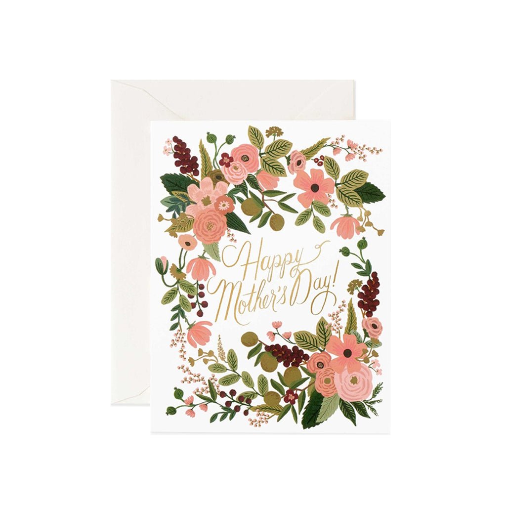 A floral Mother's Day greeting card with gold foil details, accompanied by a soft white envelope.