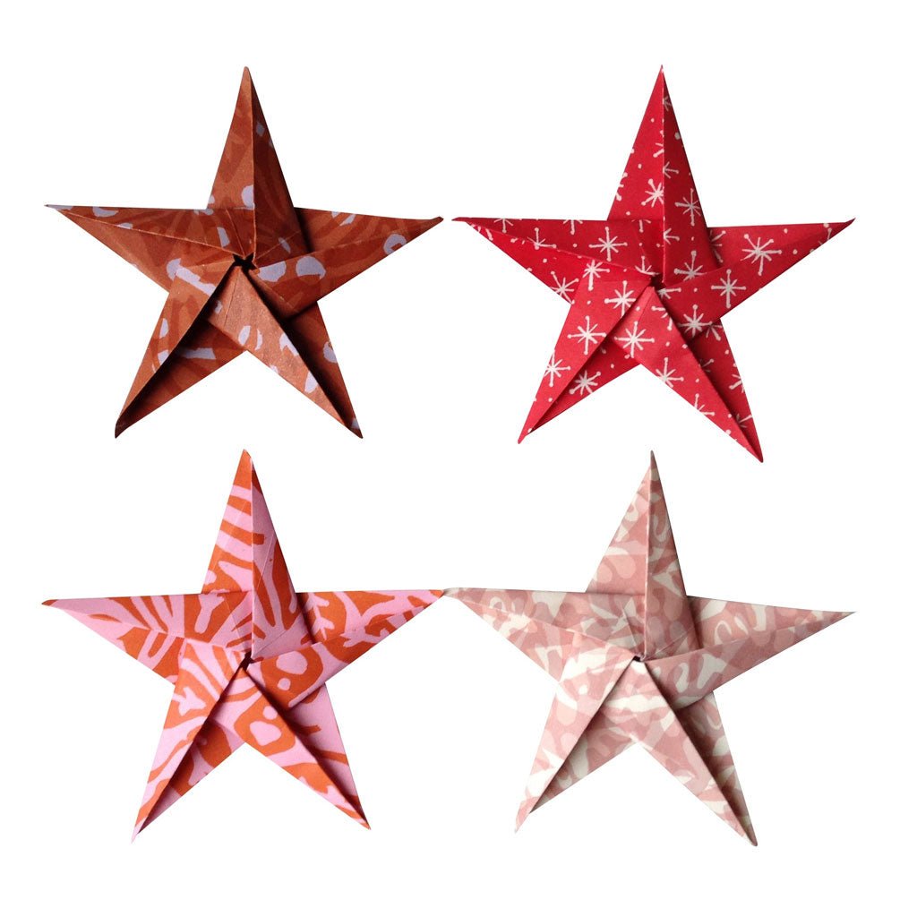 Four origami stars in assorted red and pink patterns