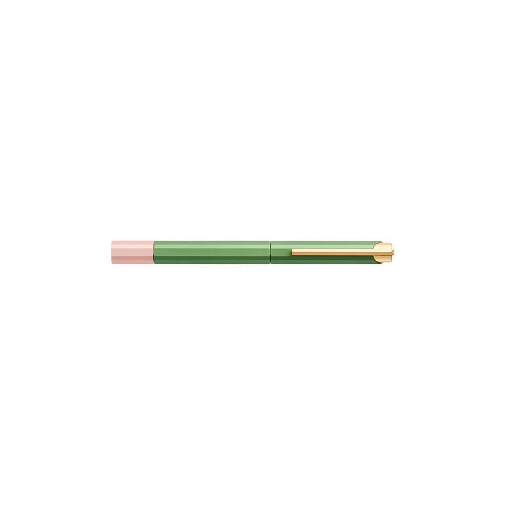 Green pen with gold accents on a white background