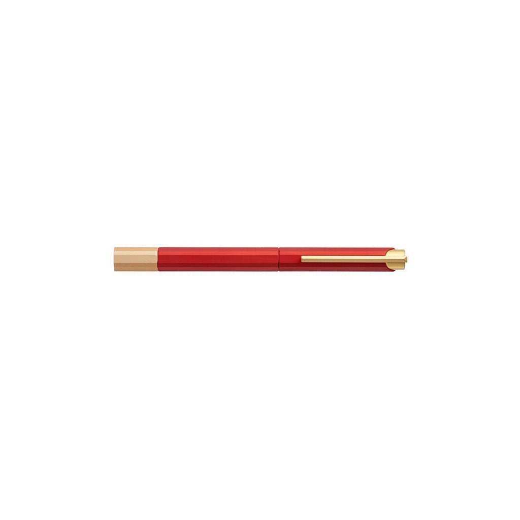 Red pen with gold accents on a white background