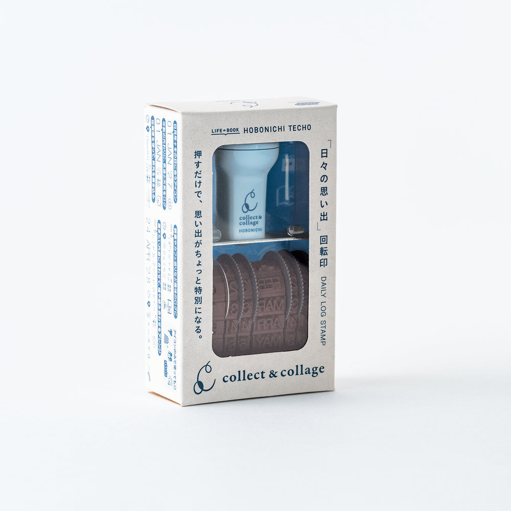 A collect & collage Hobonichi Techo daily log stamp set in its packaging, featuring a white box with a clear window showing the blue and brown stamp inside.