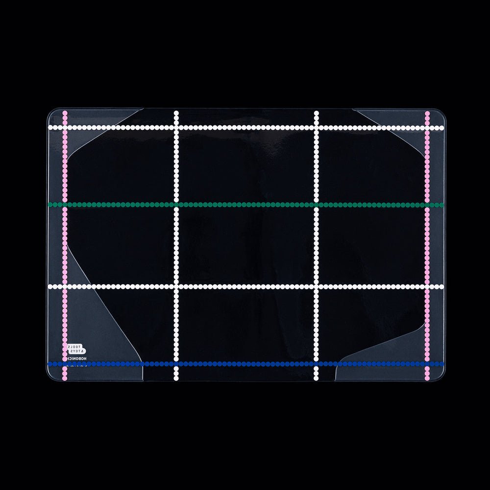 Clear cover for A5 Hobonichi Techo cover with colorful dotted plaid pattern against black background