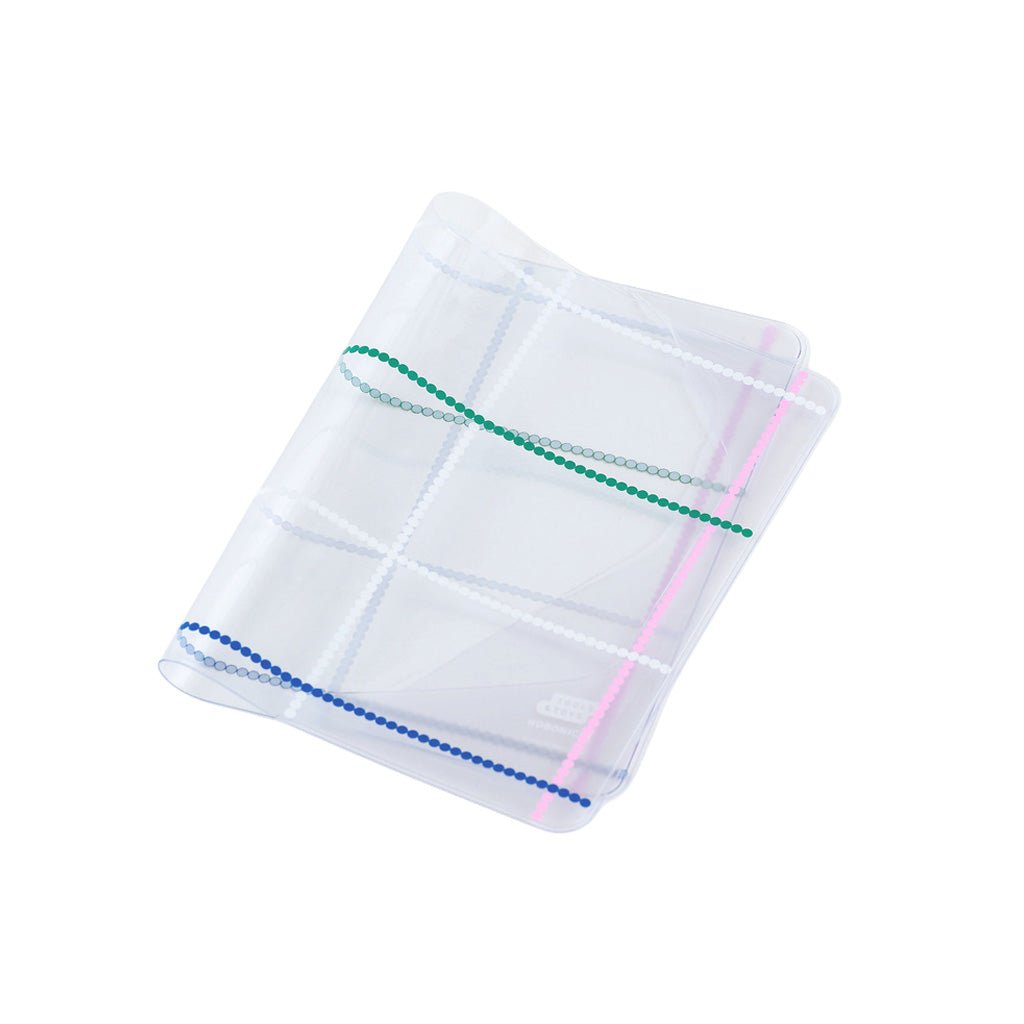 Clear cover for A6 Hobonichi Techo cover with colorful dotted plaid pattern against white background