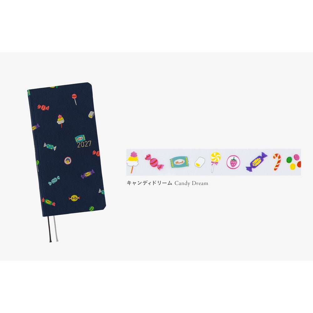 A dark navy blue hardcover notebook with a colorful candy print, shown alongside a matching horizontal strip of candy illustrations and the text 'Candy Dream'.
