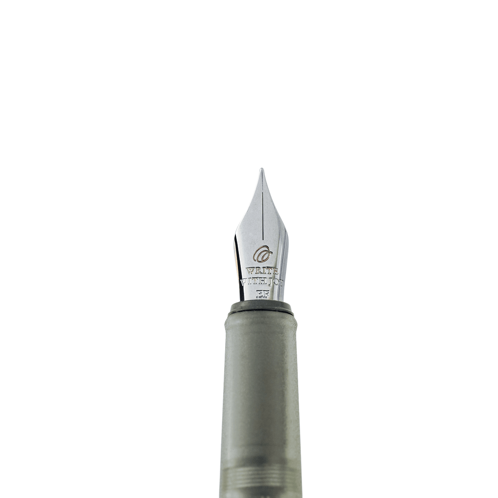 Close-up of a fountain pen nib with the text 'Write with Joy' and gray barrel against a plain white background.