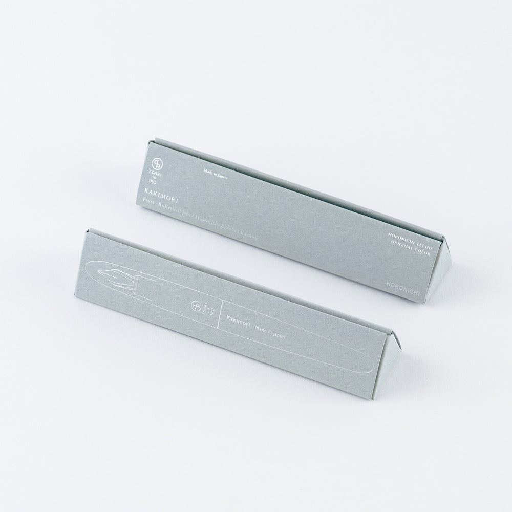 Two triangular light gray boxes for fountain pen on white background
