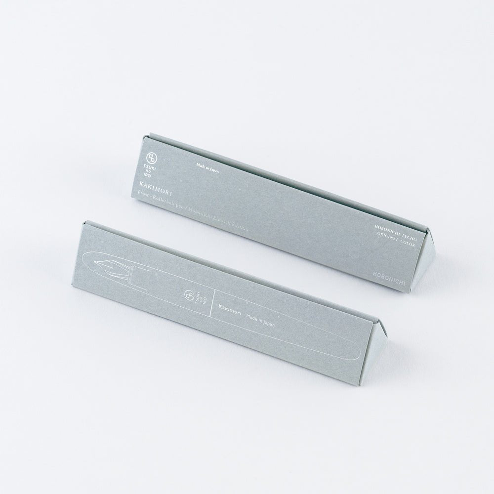 Two triangular light gray boxes for fountain pen on white background