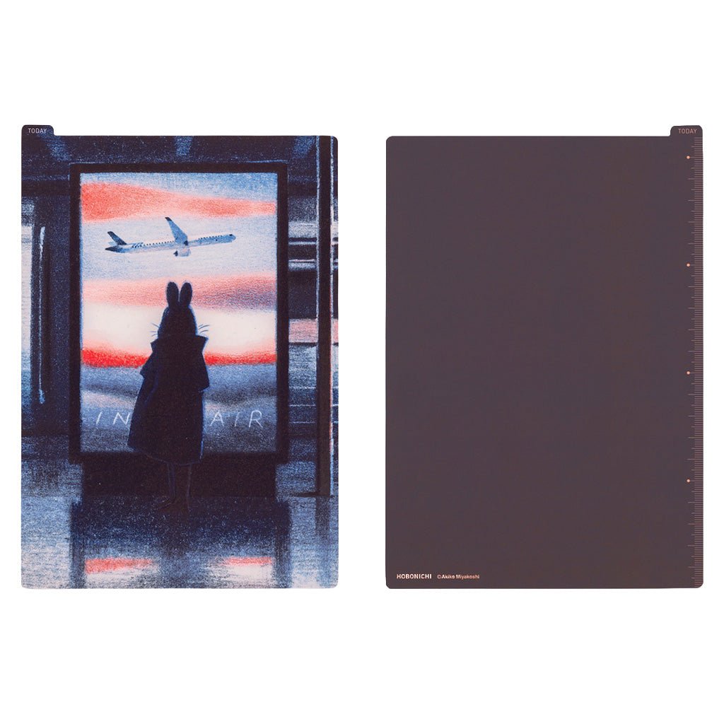 Front and back of a rectangular pencil board for A5 Techo. The front design has a rabbit figure in front of airport window with colorful sunset, and the back is a plain dark purple.
