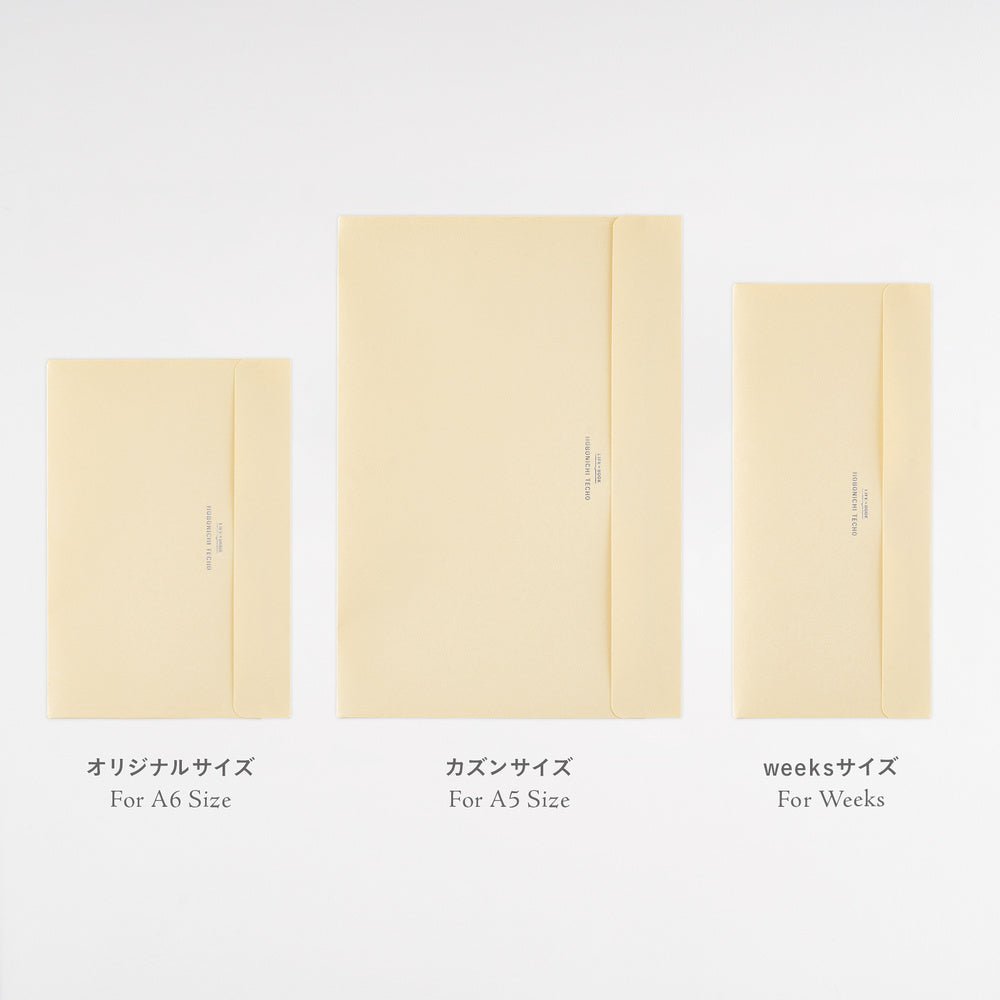 Three cream-colored paper envelopes of different sizes arranged side by side on a white background, with Japanese and English size labels underneath.