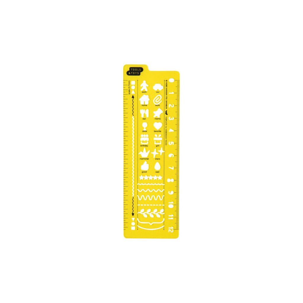 Yellow acrylic stencil with symbols on white background