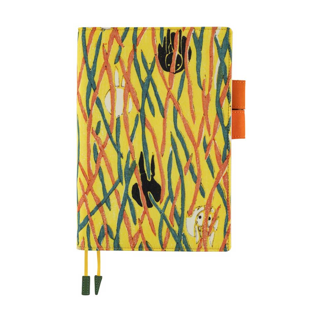 Front of Hobonichi Unsodo A5 Cousin Book in Yellow Cover with white and black rabbits under abstract orange and blue linear design and two orange pen loops on white background