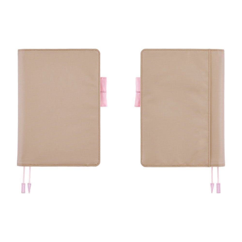 Two views of a greige Hobonichi Techo cover on a white background, showing the front and back with pink pen loops and ribbon bookmarks.