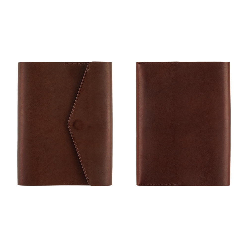 The front and back of a Hobonichi Techo cover shown side by side on a plain white background. The left (front) has a diagonal flap closure with a snap button, and the right (back) is plain brown leather.
