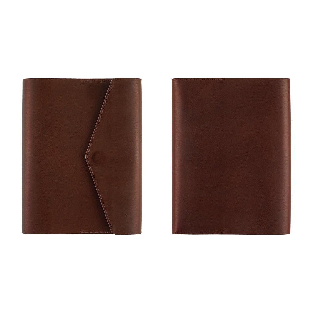 The front and back of a Hobonichi Techo cover shown side by side on a plain white background. The left (front) has a diagonal flap closure with a snap button, and the right (back) is plain brown leather.