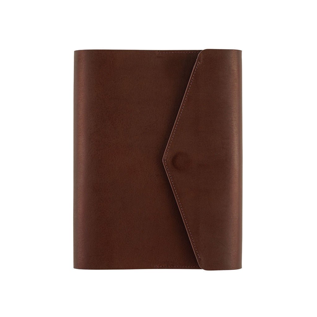 A brown leather Hobonichi Techo cover with a diagonal flap and snap button closure, shown against a plain white background.