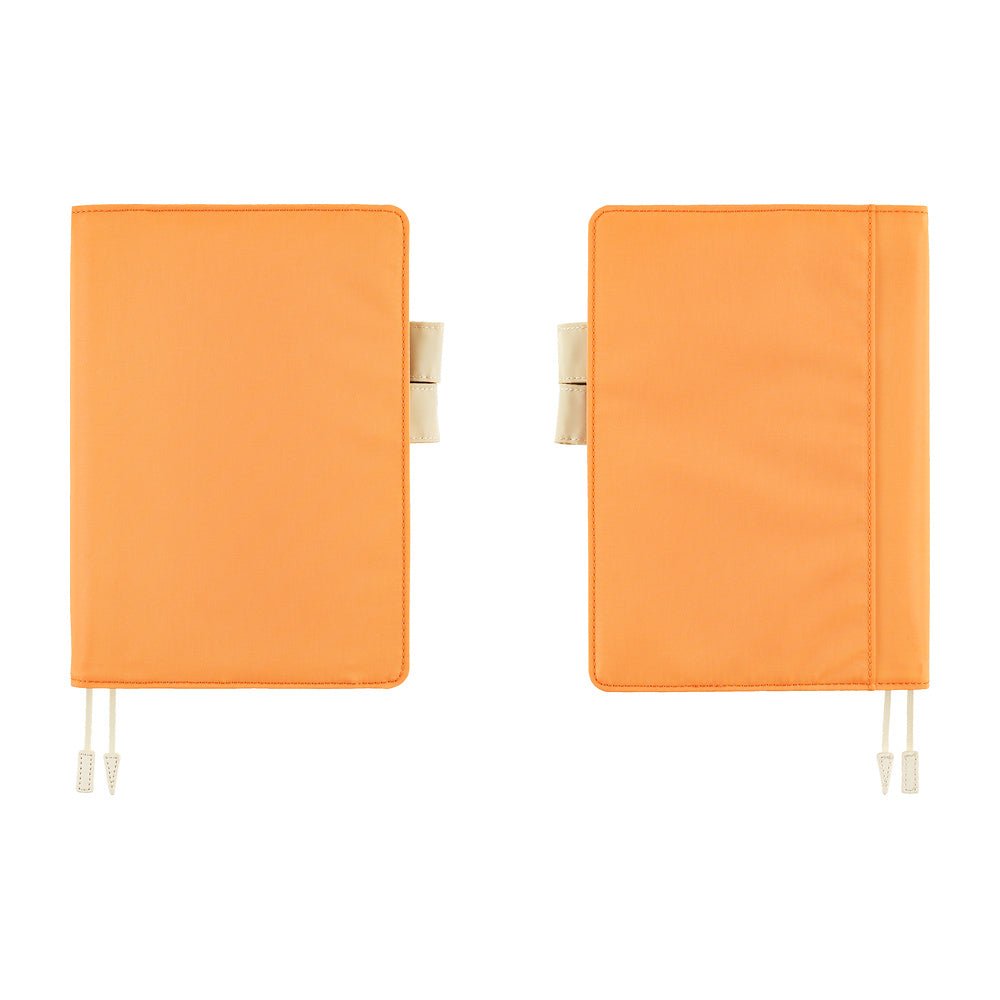 Two orange planner covers shown side by side on a plain white background, each with ivory loop details and bookmark strings.