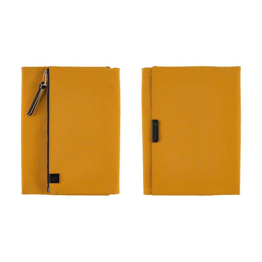 Front and back mustard yellow Hobonichi Tragen tri-fold covers with a vertical zippered pouch and black zipper pull shown side by side on a plain white background.
