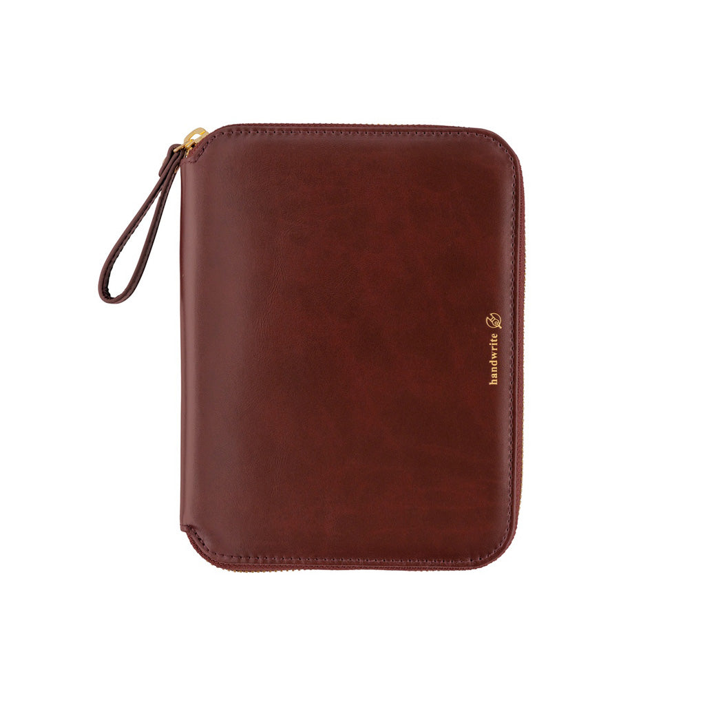 A dark brown leather zip-around document pouch with a wrist strap and gold-tone hardware, shown on a plain white background.