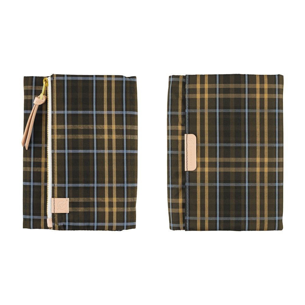Two views of a zippered pouch or notebook cover in a dark green and tan plaid pattern with light blue lines, shown on a plain white background.